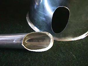  view of flange on the end of the spout
